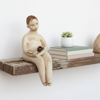 Niño con rama de olivo